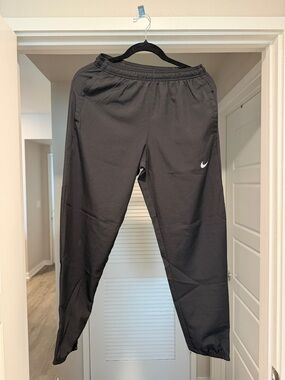 Nike Black Track Pants with White Swoosh